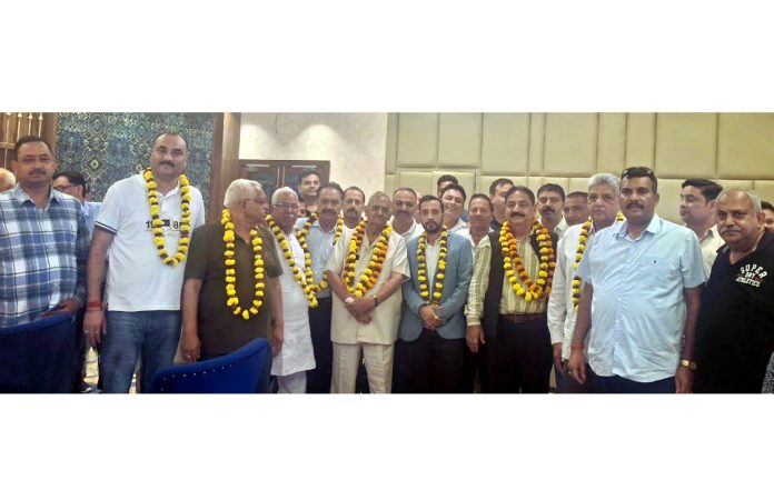 The members of Brick Kiln Owners Association during a meeting in Jammu on Sunday.