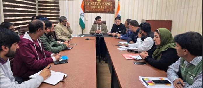Div Com Kashmir chairing a meeting at Baramulla.