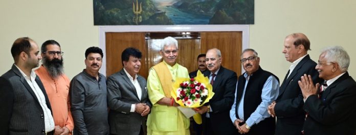 LG Manoj Sinha meeting joint delegation of Pandit Prem Nath Bhat Memorial Trust and All Minority Employees Association of Kashmir.