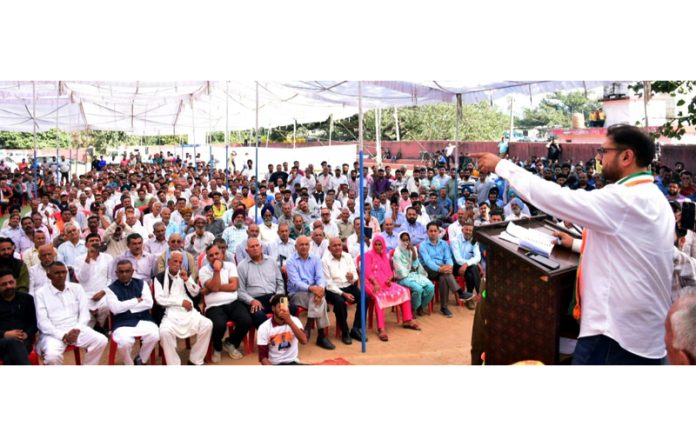 Minister Satish Sharma addressing a gathering at Maira Mandrian.