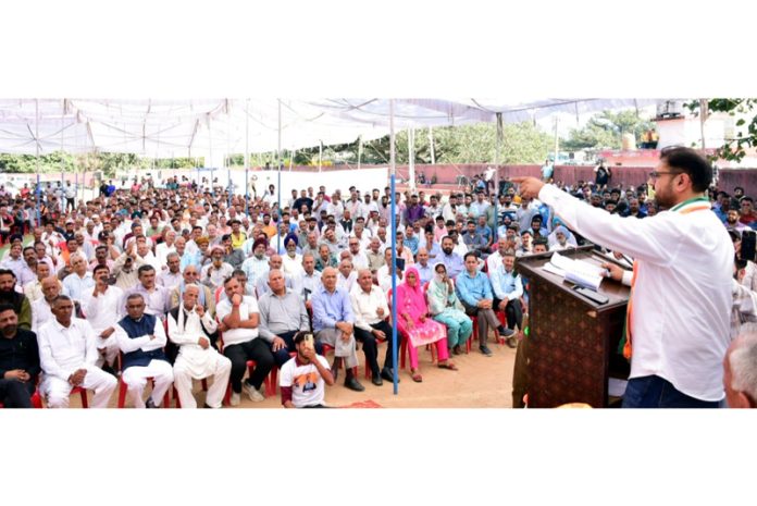 Minister Satish Sharma addressing a gathering at Maira Mandrian.