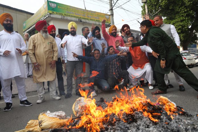 BJP Minority Morcha leaders and activists protesting at Jammu.