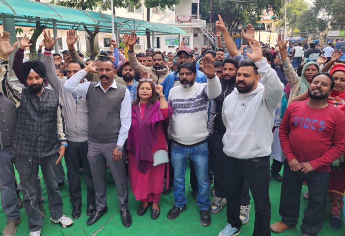 Civic Safai Karamcharis of JMC raising slogans during a protest demonstration in Jammu on Monday.