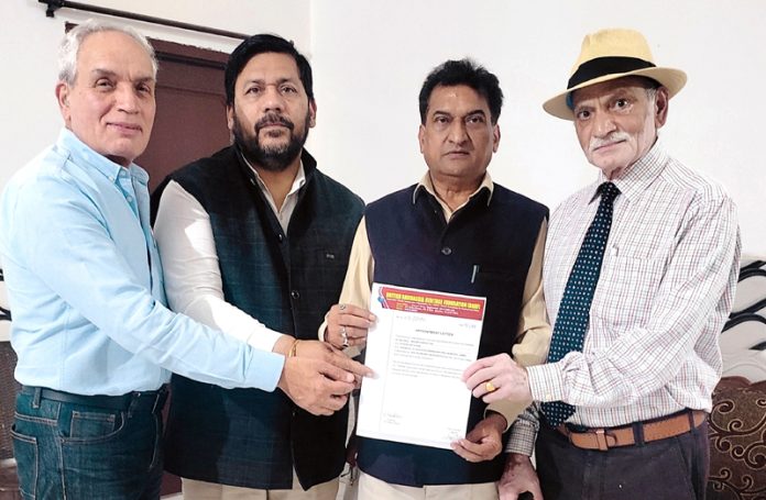 BJP leader from J&K, Balbir Ram Rattan receiving the letter of appointment as general secretary of BRHF from its chairman and general secretary at Phagwara, Punjab.