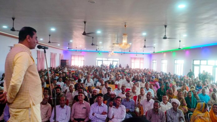 MLA Rajiv Jasrotia addressing a function at Mangloor on Saturday.