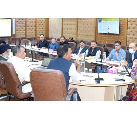 Commissioner Secretary chairing a meeting at Jammu on Wednesday.