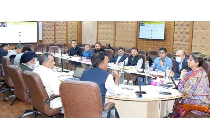 Commissioner Secretary chairing a meeting at Jammu on Wednesday.