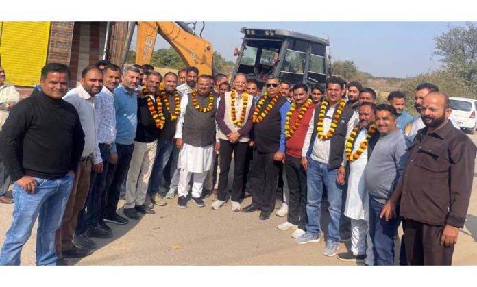 MLA Chander Parkash Ganga kick-starting work of drain in Vijaypur on Thursday.