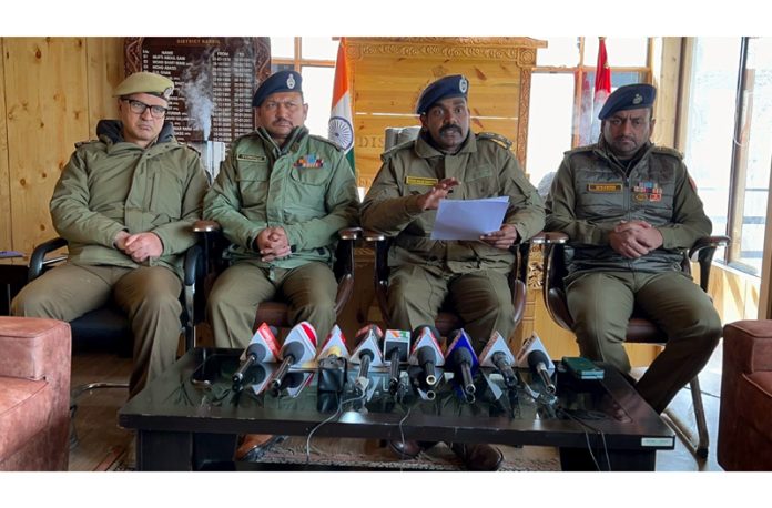 Senior police officers addressing media persons in Kargil on Tuesday. -Excelsior/Basharat Ladakhi