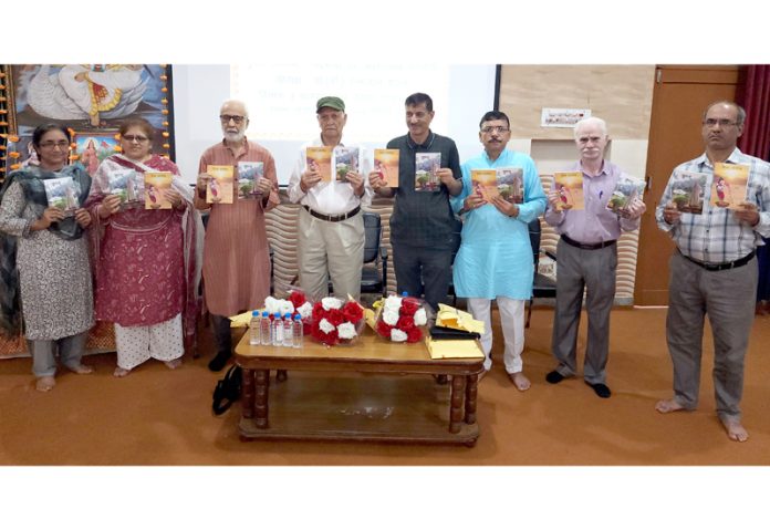 Dignitaries releasing two books at Jammu on Sunday. —Excelsior/Rakesh