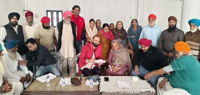 HoD Cardiology GMC & SSH Jammu Dr Sushil Sharma examining patients at RS Pura on Sunday.