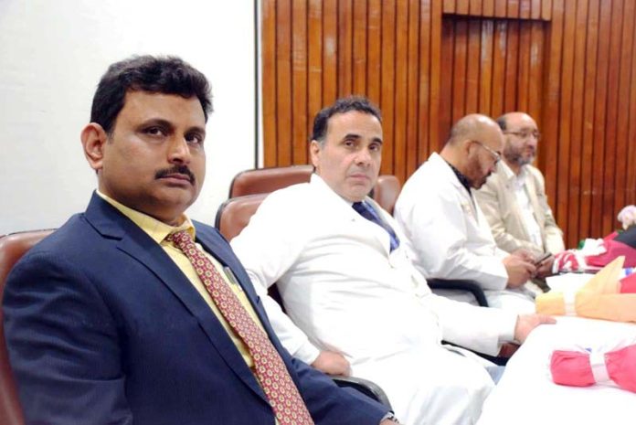 Director SKIMS Prof Mohd Ashraf Ganie along with others during a function held in Srinagar on Wednesday.