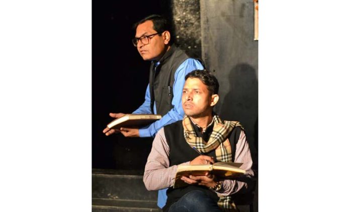 Artists performing during a play being staged in Jammu on Sunday.