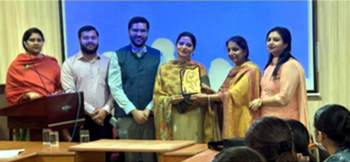 Prof. Sandeep Kour Tandon, Director CDOE felicitating Anudeep Kaur in Jammu on Tuesday.