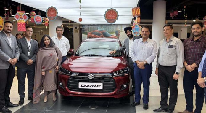 Rachna Arora, National Head of Axis Bank, launching new Dzire at Jammu Motors on Wednesday.