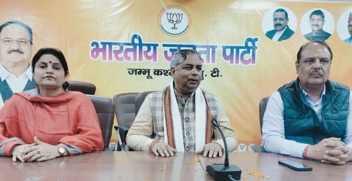 BJP president, Sat Sharma, former Minister Priya Sethi and ex MLA Rajiv Sharma at a party meeting in Jammu on Friday.