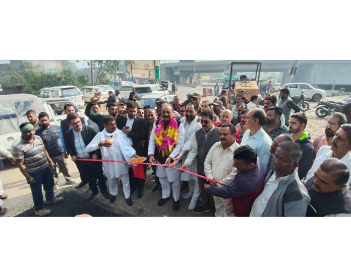 MLA Samba, Surjit Singh Slathia kick-starting blacktopping of Samba-Mansar road on Monday.