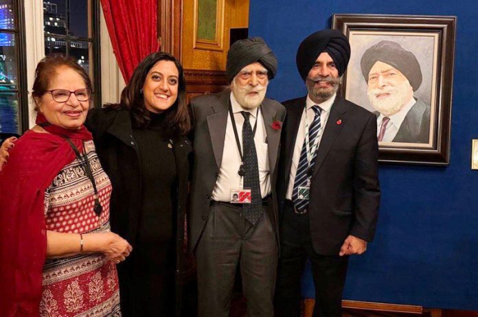 Lord Dr Indarjit Singh with his family members.