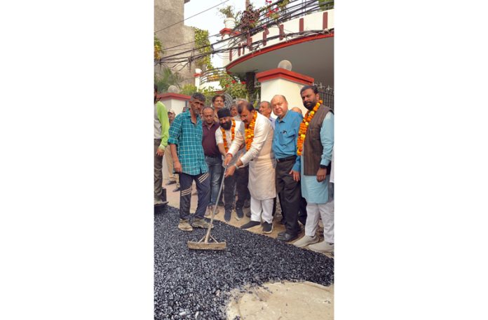 MLA Arvind Gupta inaugurating the macadamization of roads in Jammu on Saturday.