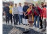 MLA Arvind Gupta kick-starting blacktopping work of road in Kabir Colony on Thursday.