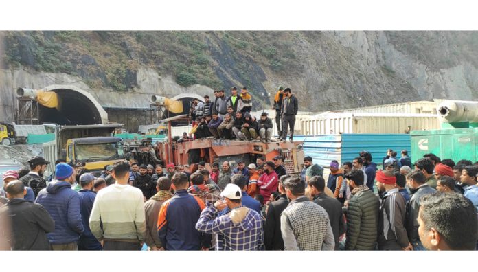 Tunnel construction workers during a protest at Digdool in Ramban on Thursday. —Excelsior/Parvez Mir