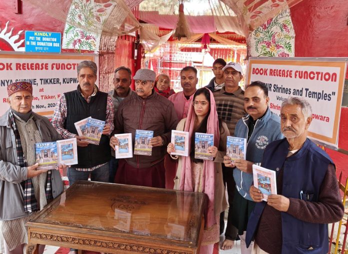 DC Kupwara, Ayushi Sudan and other dignitaries releasing two books on shrines of Kashmir at Tikker on Friday.