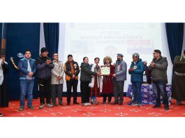 CEC Dr. Mohd Jaffer Akhoon felicitating the students participated in folk dance competition held in Kargil on Monday.