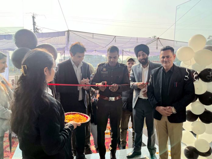 Sanjay Aggarwal, MD of Jammu Motors inaugurating new showroom at Kathua on Tuesday.