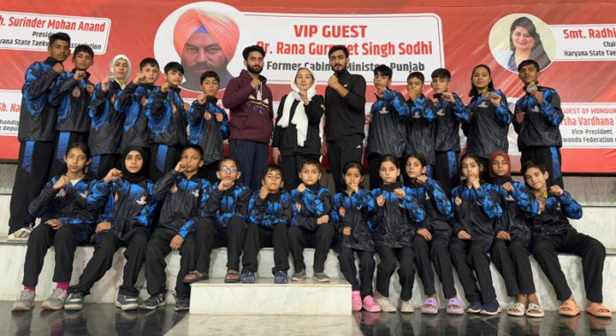 J&K Sub Junior Taekwondo team posing for group photograph.