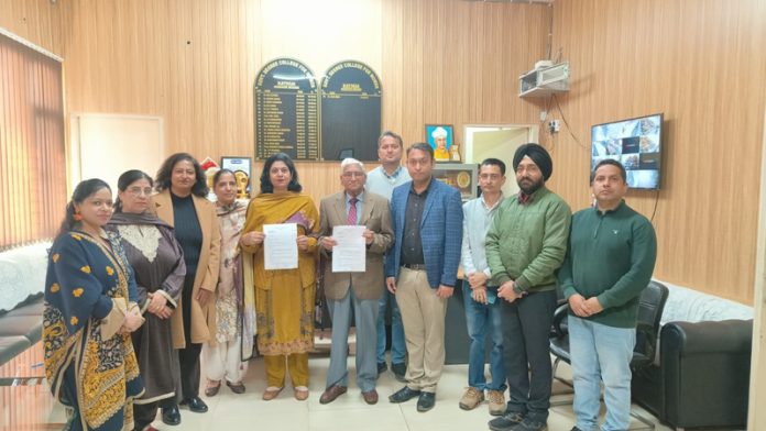 Management of Spring Dales English School, Kathua and GDCW, Kathua posing with MoU.