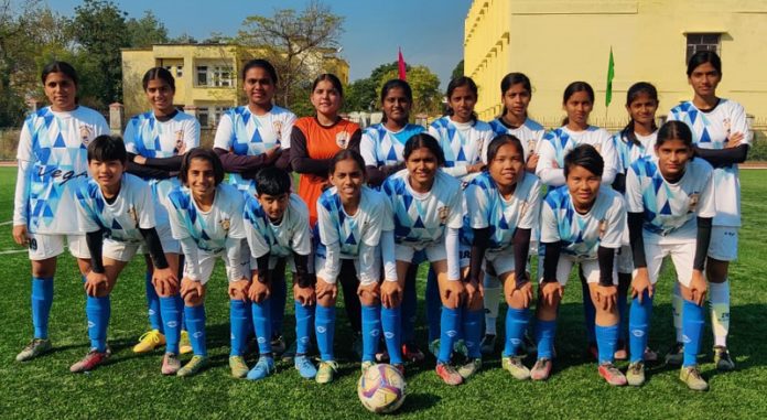 Players pose for a group photograph during the ongoing 68th National School Games U-17 Girls Football Championship at Sainik School Nagrota.