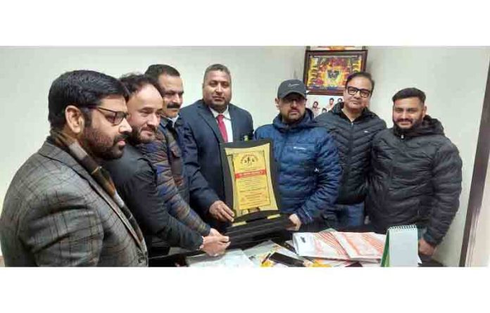 Powerlifters presenting memento to Sports Minister Satish Sharma.