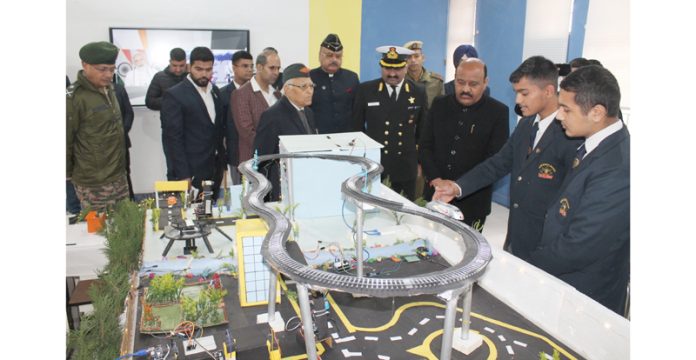 Dy CM, Surinder Choudhary inspecting the science exhibition at Sainik School Nagrota on Monday