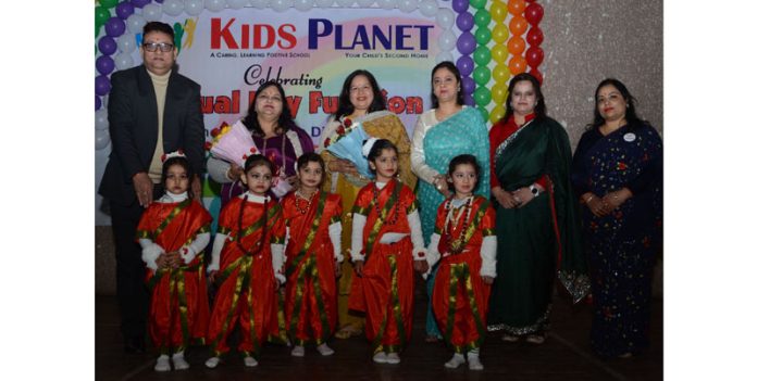 Students posing along with management during Annual Day celebrations at Kids Planet Pre-School, Jammu.