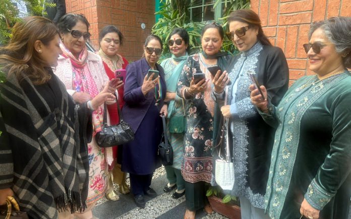 BJP Mahila Morcha leaders during membership drive in Bahu constituency of Jammu.