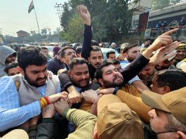 Youth Cong activists taking out protest march in Jammu. -Excelsior/Rakesh