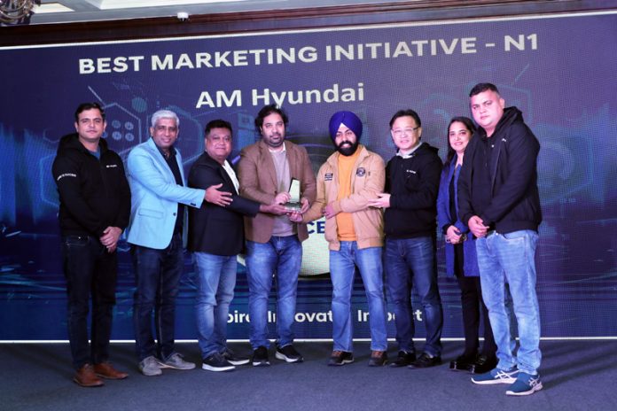 Dignitaries from AM Hyundai Jammu receiving awards at Delhi.