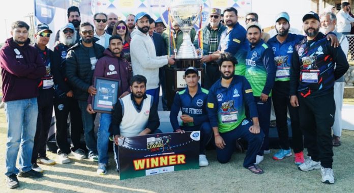 Winning team posing with the trophy during award ceremony in Jammu on Friday.