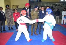 DIG Jammu Shiv Kumar Sharma and others during opening ceremony of 1st North India Karate Championship at Jammu on Friday.