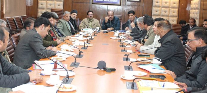 DyCM Surinder Kumar Choudhary chairing a meeting.