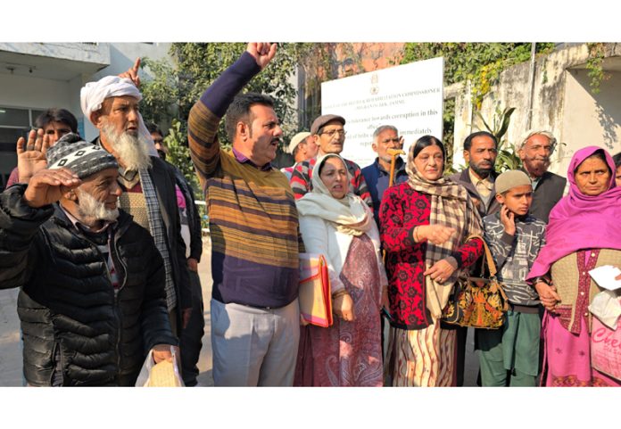 Muslim migrants staging protest at Relief Commissioner's office in Jammu. -Excelsior/Rakesh