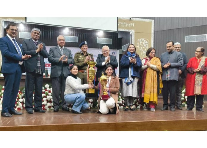 The winner team of Indira Gandhi GDC posing with trophy in Jammu on Tuesday.