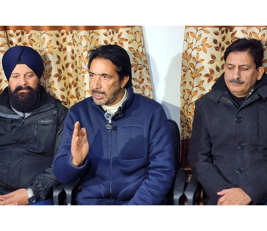 AICC General Secretary G.A. Mir addressing a press conference in Srinagar on Tuesday. -Excelsior/Shakeel