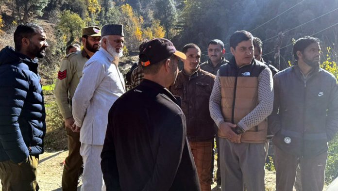 Former Minister GM Saroori interacting with people at Dangduru village near Kishtwar on Thursday.