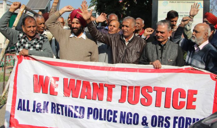 Retired police personnel staging a demonstration in favour of their demands in Jammu on Thursday. -Excelsior/Rakesh