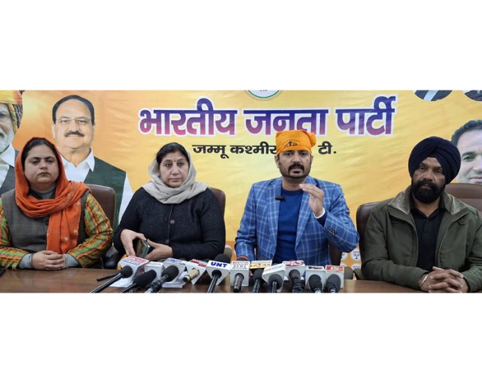 Senior BJP leader Dr Abhijeet Jasrotia addressing a press conference in Jammu on Friday.