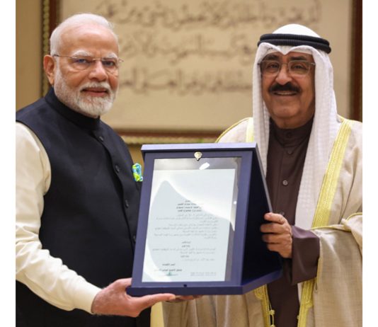 Prime Minister Narendra Modi receives Kuwait's highest honour 'The Order of Mubarak Al Kabeer' in Kuwait on Sunday. (UNI)