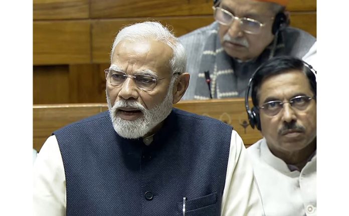 Prime Minister Narendra Modi speaking in the Lok Sabha on Saturday. (UNI)