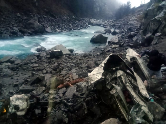 Mingled remains of a vehicle that fell into Chenab river in Kishtwar on Friday evening. —Excelsior/Tilak Raj