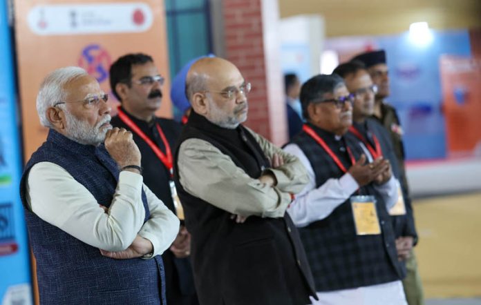 Prime Minister Narendra Modi inspects an exhibition showcasing the implementation of new criminal laws in Chandigarh on Tuesday. (UNI)